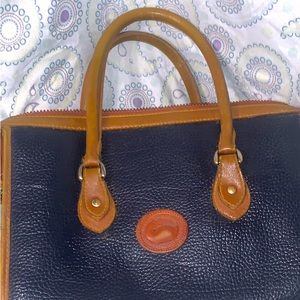 Large Dooney and Bourke purse, blue, pebbled leather.